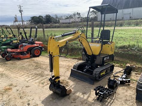 mini excavator skid steer combo|high top ht10 mini excavator.